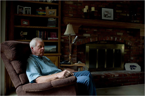 Ray Rutger, 62, sits in his living room at home. Rutger gave up his job search this year after continuously being turned down in job interviews, he believes on the basis of his age.